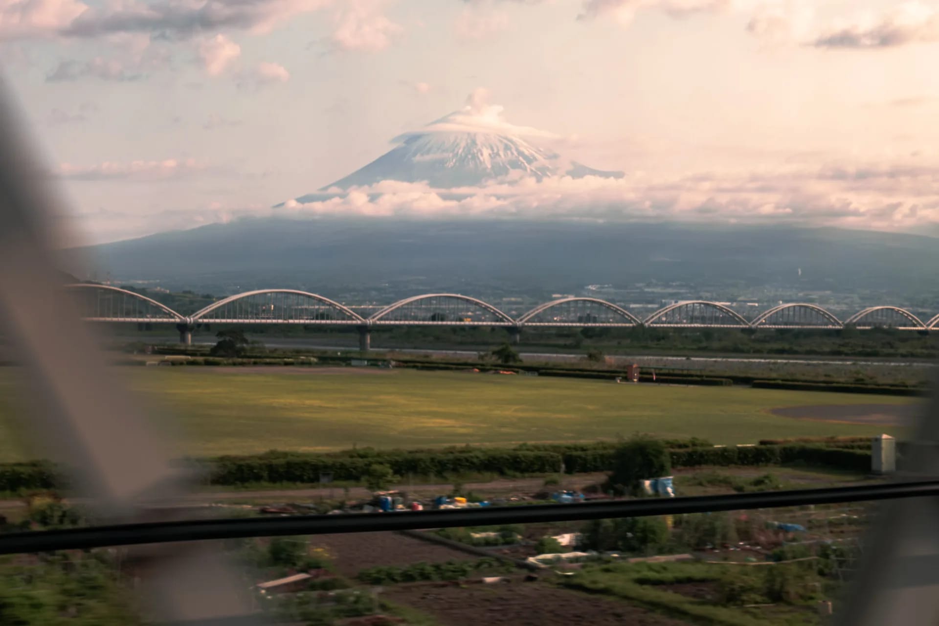 Mount Fuji behind the Fujikawa bridge of the Shinkansen line