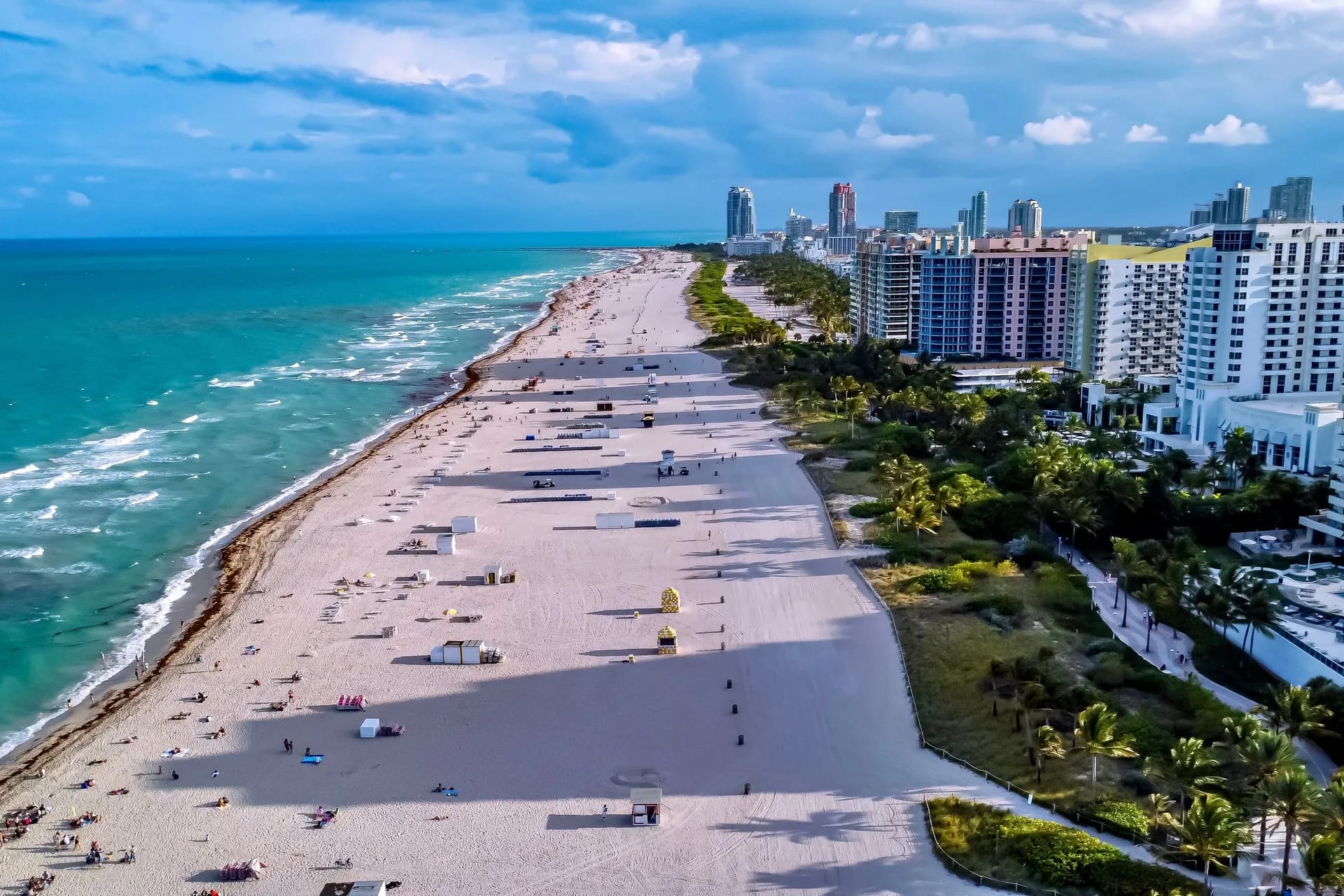 Aerial view of South Beach with a wide beach, hotels and turquoise sea