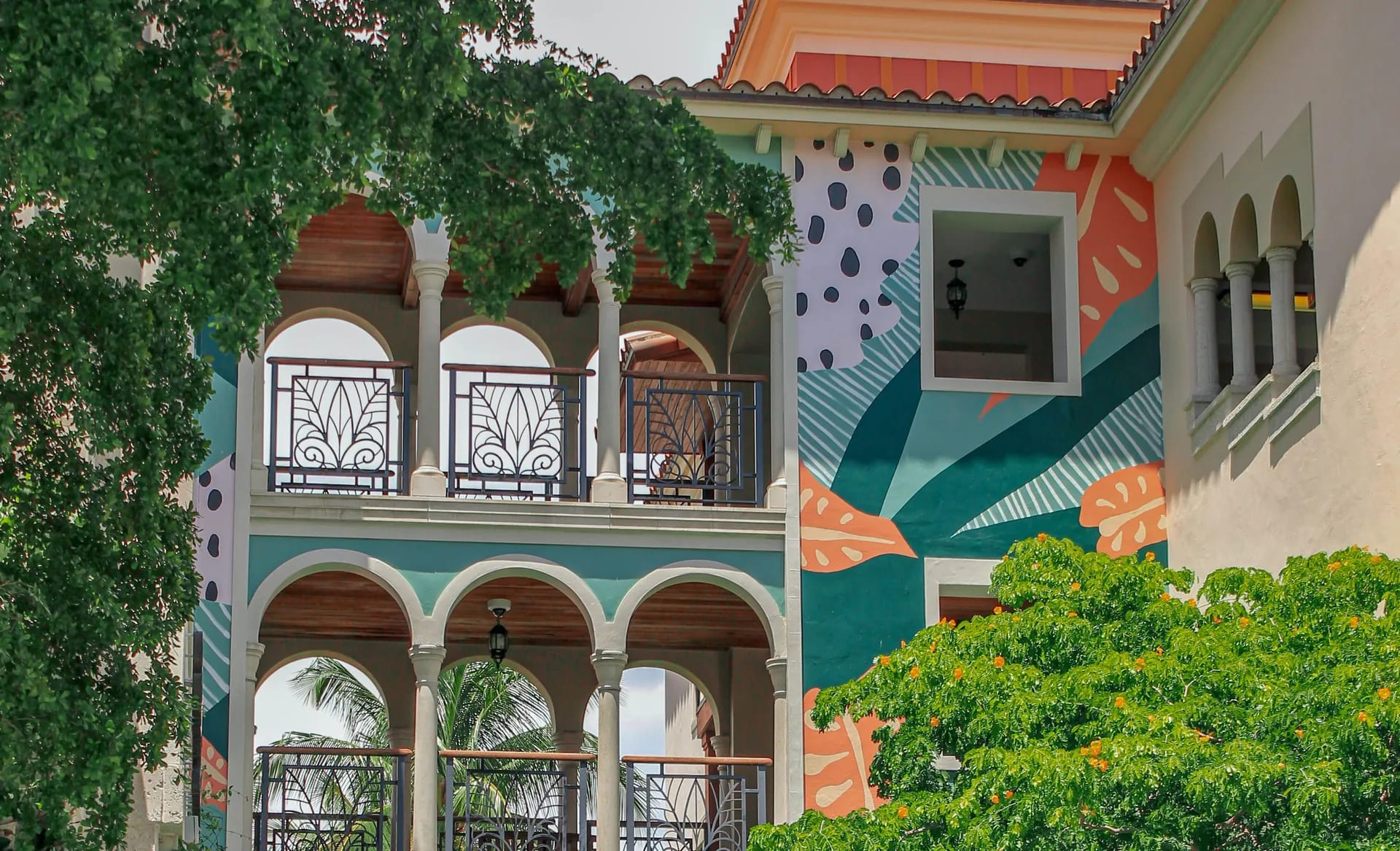 Mediterranean arcades with a colourful mural in Palm Beach