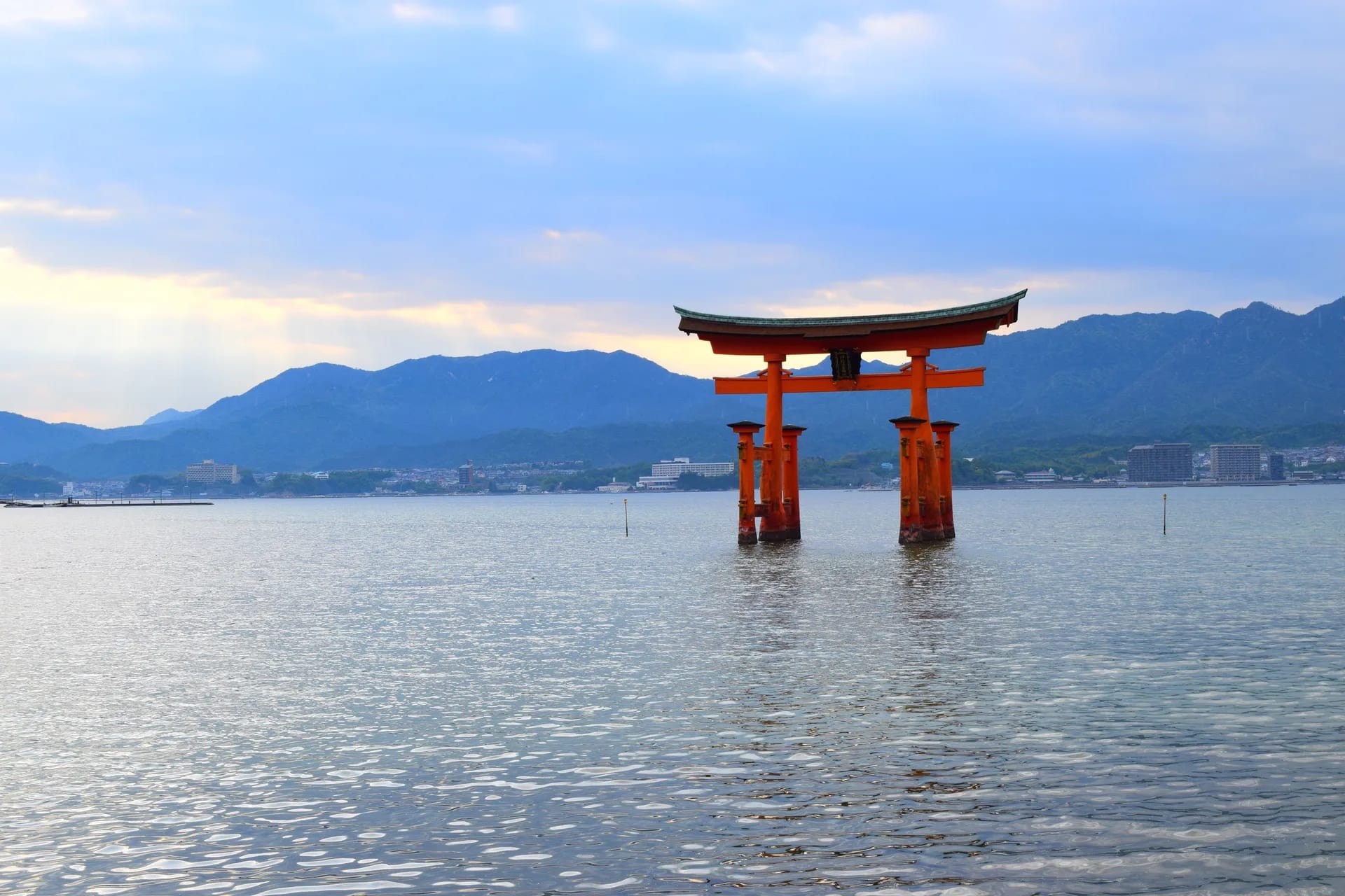 The torii of Itsukushima standing in the water off Miyajima