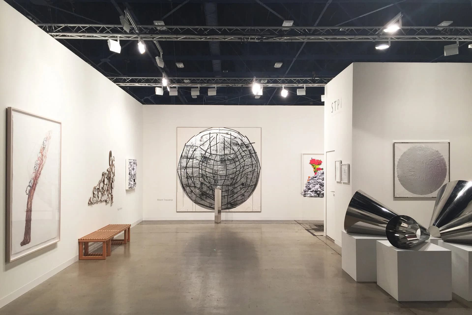 A gallery booth with sculpture and works on paper at Art Basel Miami Beach